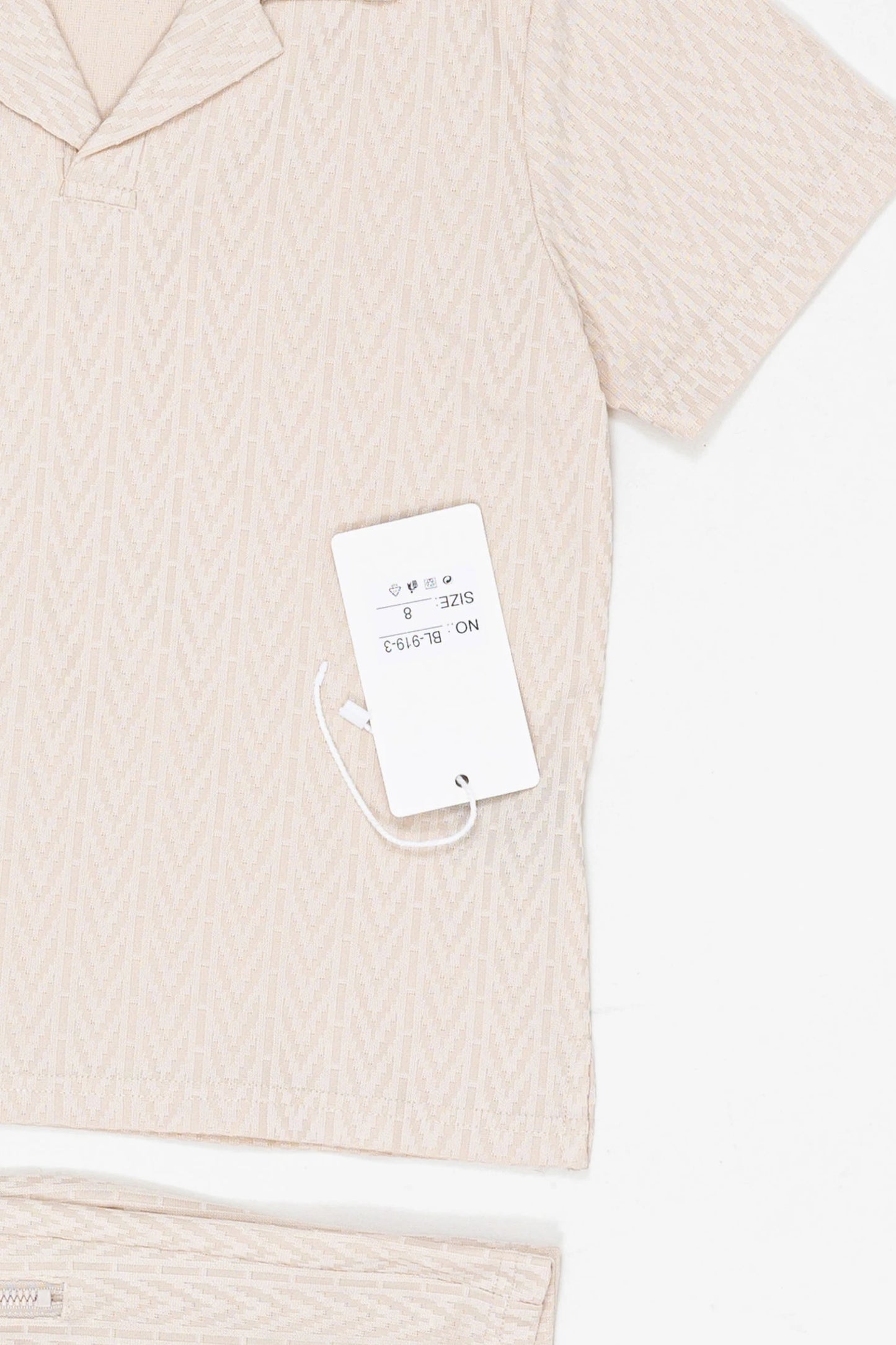 Ensemble à motifs relief top et short